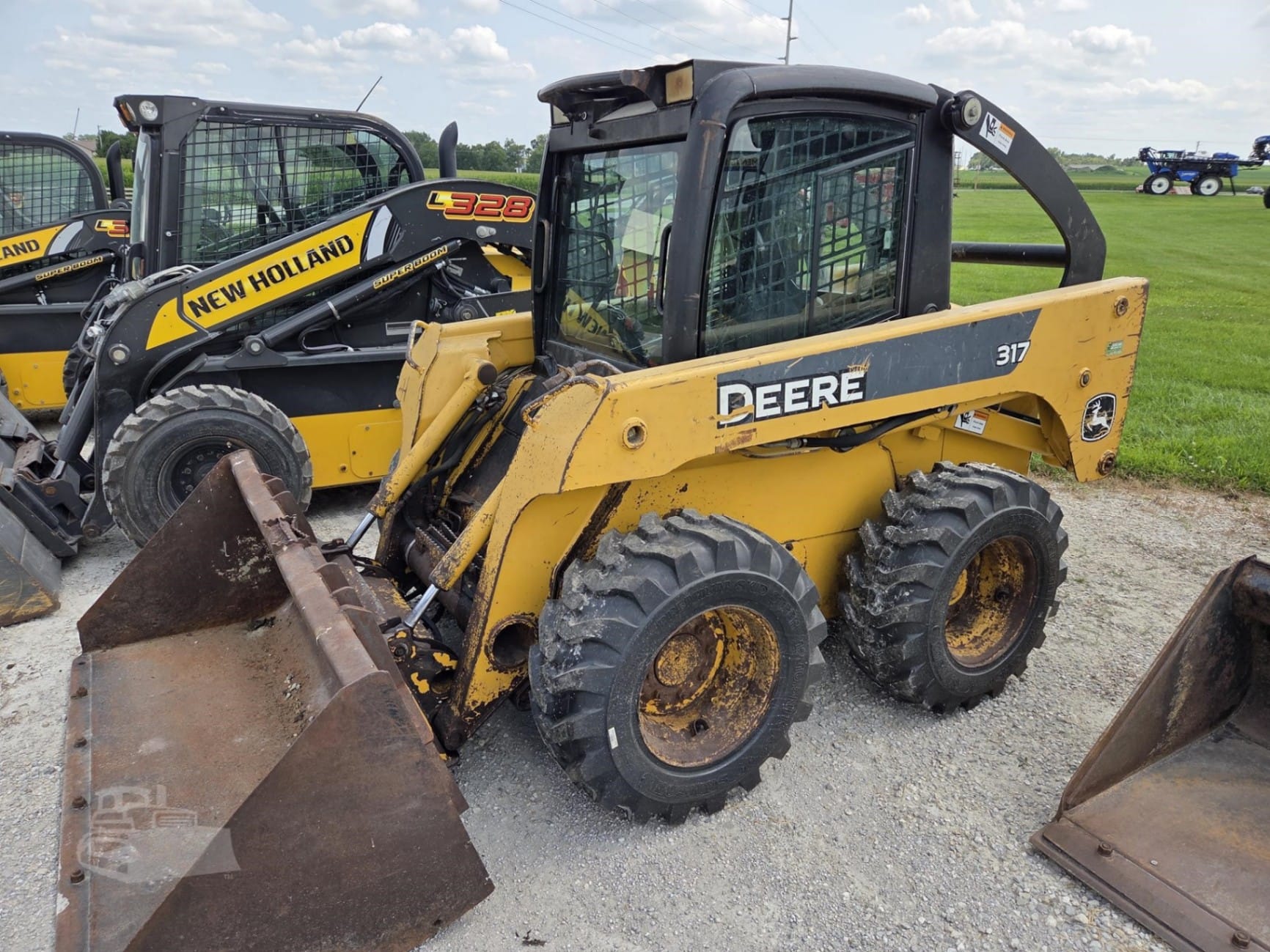 2005 John Deere 317 Skid Steer Loaders for sale in West Union, IA - primary listing photo of 9