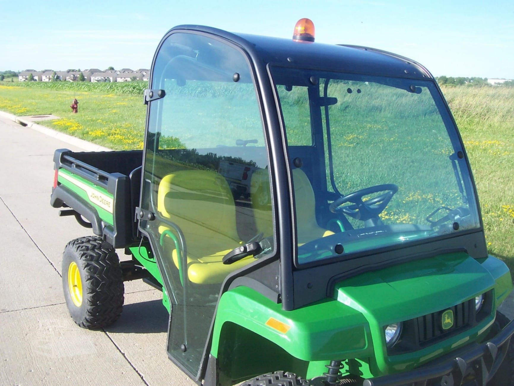2025 John Deere Gator TX Utility Tractor for sale in North Liberty, IA - listing photo 2 of 8