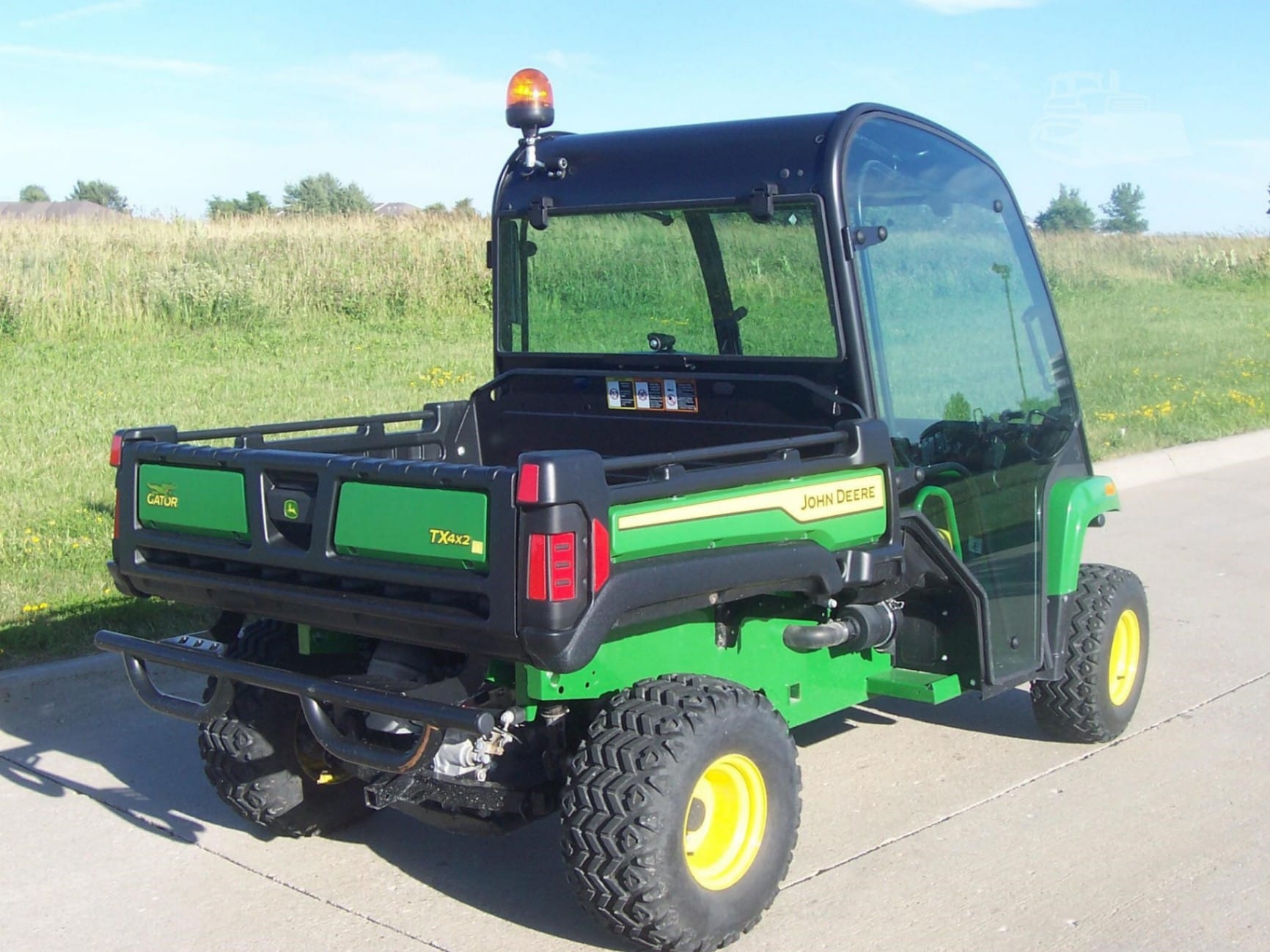2025 John Deere Gator TX Utility Tractor for sale in North Liberty, IA - listing photo 4 of 8